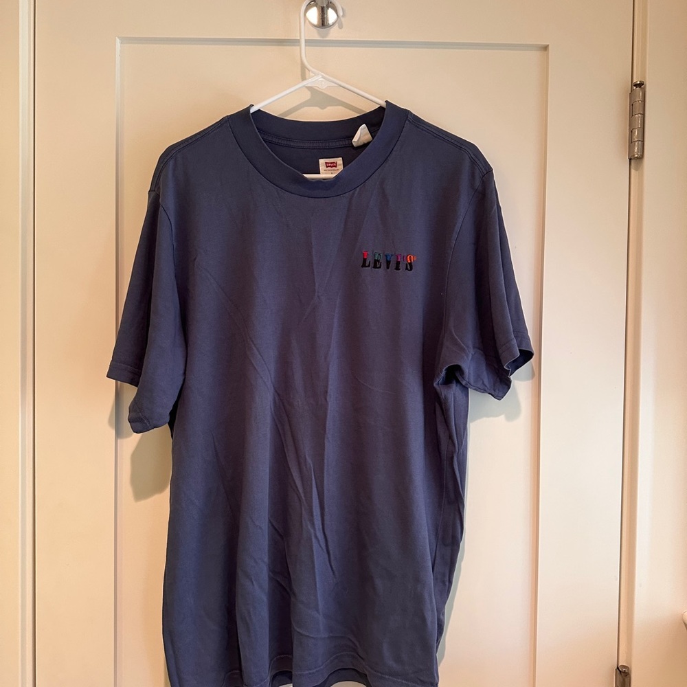 Blue Levi’s shirt